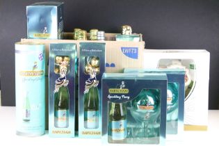 Collection of 40 bottles of Babycham, of varying sizes, to include 12 gift sets (featuring