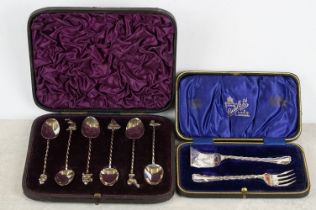 A cased set of fully hallmarked sterling silver teaspoons with decorative finials together with a