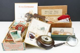 A box of mixed vintage fishing tackle to include lures, flies and feathers.