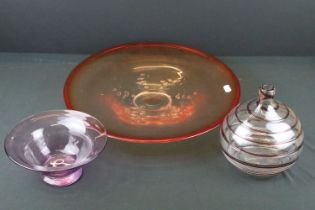 Three pieces of 20th century studio glassware to include an orange circular dish with air bubble