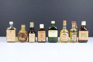 Eight vintage whisky miniatures to include 1950s 70% proof examples; Black & White, Dimple Scots,