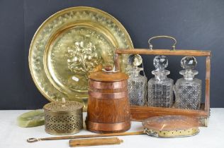 Late 19th / early 20th century oak tantalus with silver plated mounts, housing three cut glass