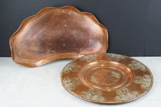 Art Nouveau copper charger with repeating embossed berry decoration within reeded cartouches (40.5cm