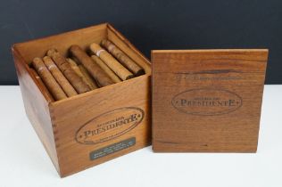 A large collection of mixed cigars to include Cuban examples contained within a wooden box.