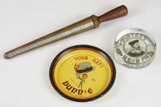 A players Navy cut glass paperweight together with a Dunn & Co advertising ashtray and a ring sizer.