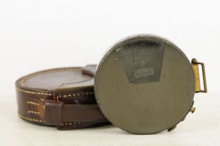 Early 20th century pocket clinometer, leather cased. (Clinometer approx 7cm diameter)