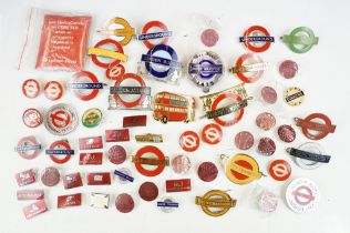 A good collection of London Underground railway badges to include enamel cap badges