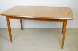 Mid century Retro Vanson Teak extending Dining Room Table raised on square tapering legs, label to