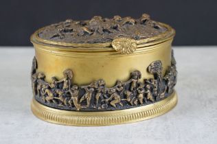 A decorative gilt metal jewellery box / casket with figural decoration. Measures approx 13cm wide