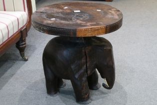 African Hardwood Side or Lamp Table, the round top formed from a single cross-section of a tree,