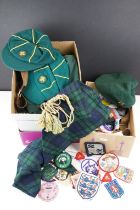 A large collection of Scout and girl guide collectables to include uniforms, belts, badges....etc.