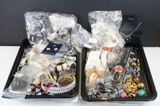 A large collection of mixed costume jewellery to include necklaces, earrings, bracelets....etc..