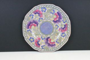 Charlotte Rhead for Crown Ducal shaped circular plate, tube lined with stylised flowerheads, blue