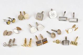 A collection of gents cufflinks to include hallmarked gold and hallmarked silver examples.