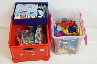 Collection of assorted loose lego, duplo and paymobil across two boxes. Includes Lego arctic