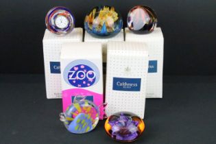 Five Caithness glass paperweights to include The Millennium Clock New Era clock paperweight, a Colin