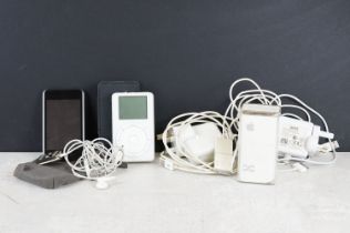 A collection of Apple Ipods to include the shuffle complete with accessories.