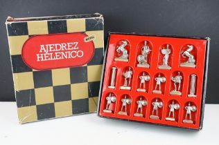 Ajedrez Helenico cast metal chess set in the form of figures from ancient Rome within original box.