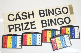 Two Bingo rectangular wall signs to include 'Cash Bingo' and 'Prize Bingo', approx 107cm wide;