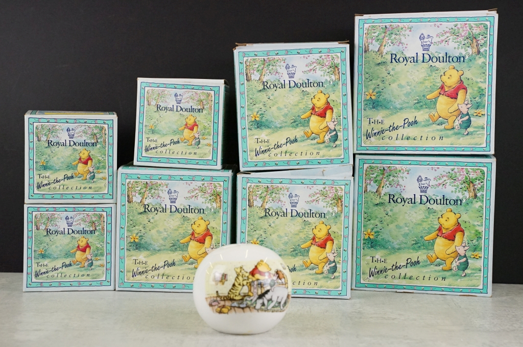 Eight boxed Royal Doulton 'Winnie The Pooh Collection' ceramics / figures to include a Christopher