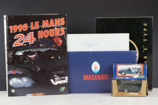 A group of automobile collectables to include ephemera and two diecast models.