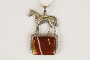 Silver Pendant Necklace in the form of a Horse mounted on marble