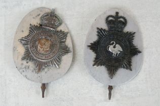 A vintage kings crown East Riding of Yorkshire constabulary helmet badge together with a QC Bucks