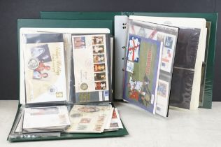 Collection of coin covers contained within two albums, approx 35 coin covers, to include 50th