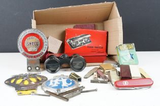 A small group of mixed collectables to include car badges, penknives, lighter, opera glasses....