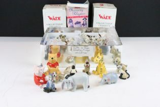 Collection of Wade and other ceramic figures to include Disney figures, Beswick musical cats, wade
