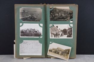 Early 20th century postcard album, housing over 100 early 20th century onwards postcards, covering a