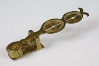 A set of antique brass sovereign scales