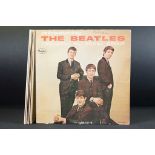Vinyl - 6 copies of Introducing The Beatles LP on Vee-Jay. Condition varies, one sealed.