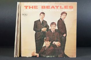 Vinyl - 6 copies of Introducing The Beatles LP on Vee-Jay. Condition varies, one sealed.