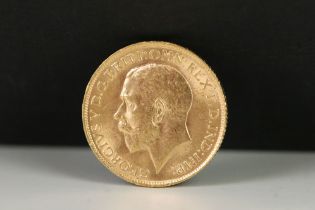 A British King George V 1914 gold full sovereign coin.