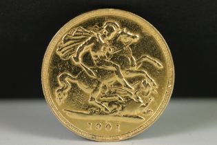 A British Queen Victoria 1901 gold half sovereign coin.