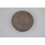 A British pre decimal silver 1676 King Charles II full crown coin.