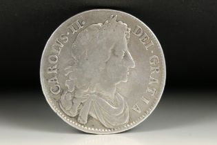 A British King Charles II early milled 1675 silver half crown coin.