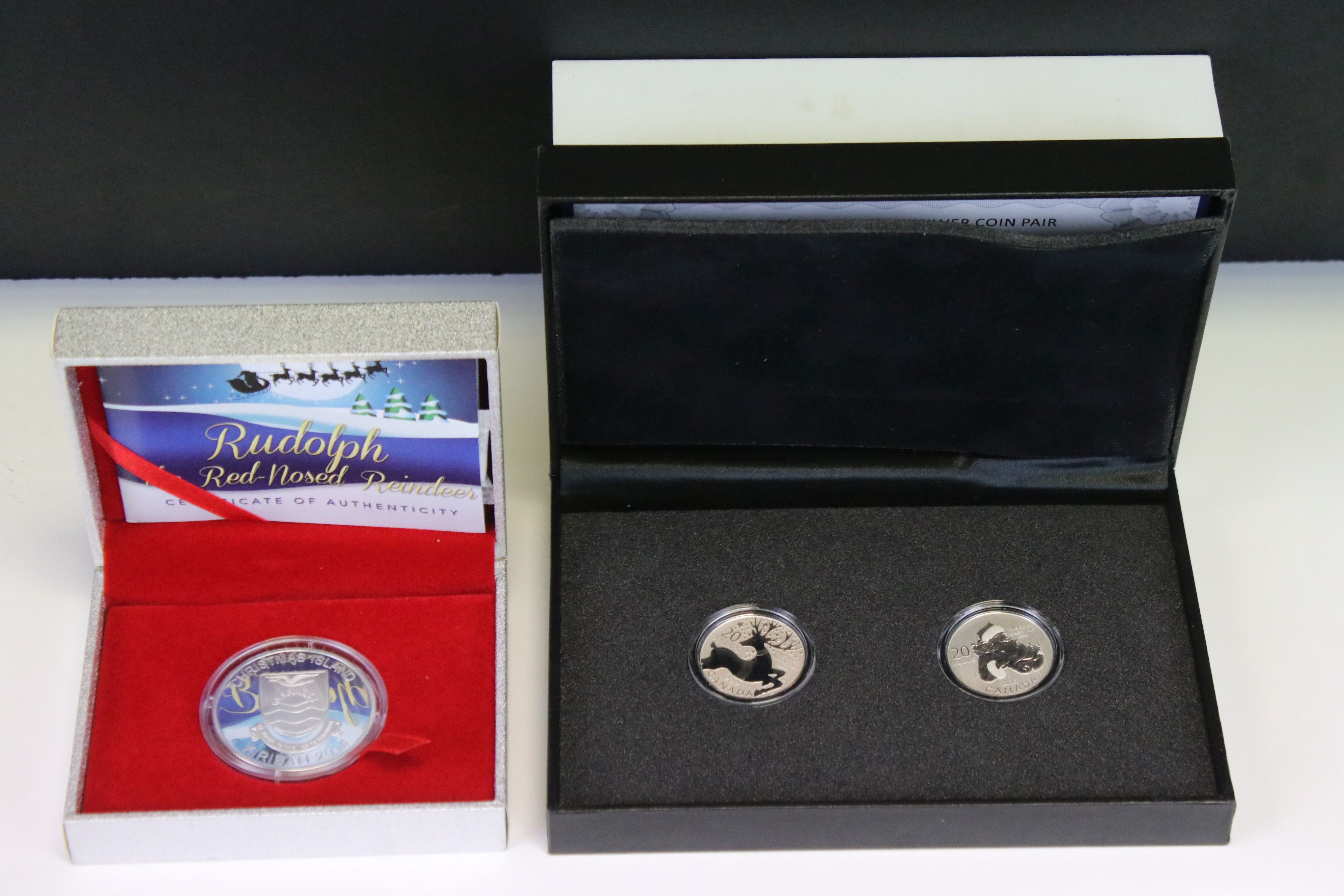 A Canada $20 silver Christmas two coin set together with a Kiribati silver $5 Rudolf the red nosed