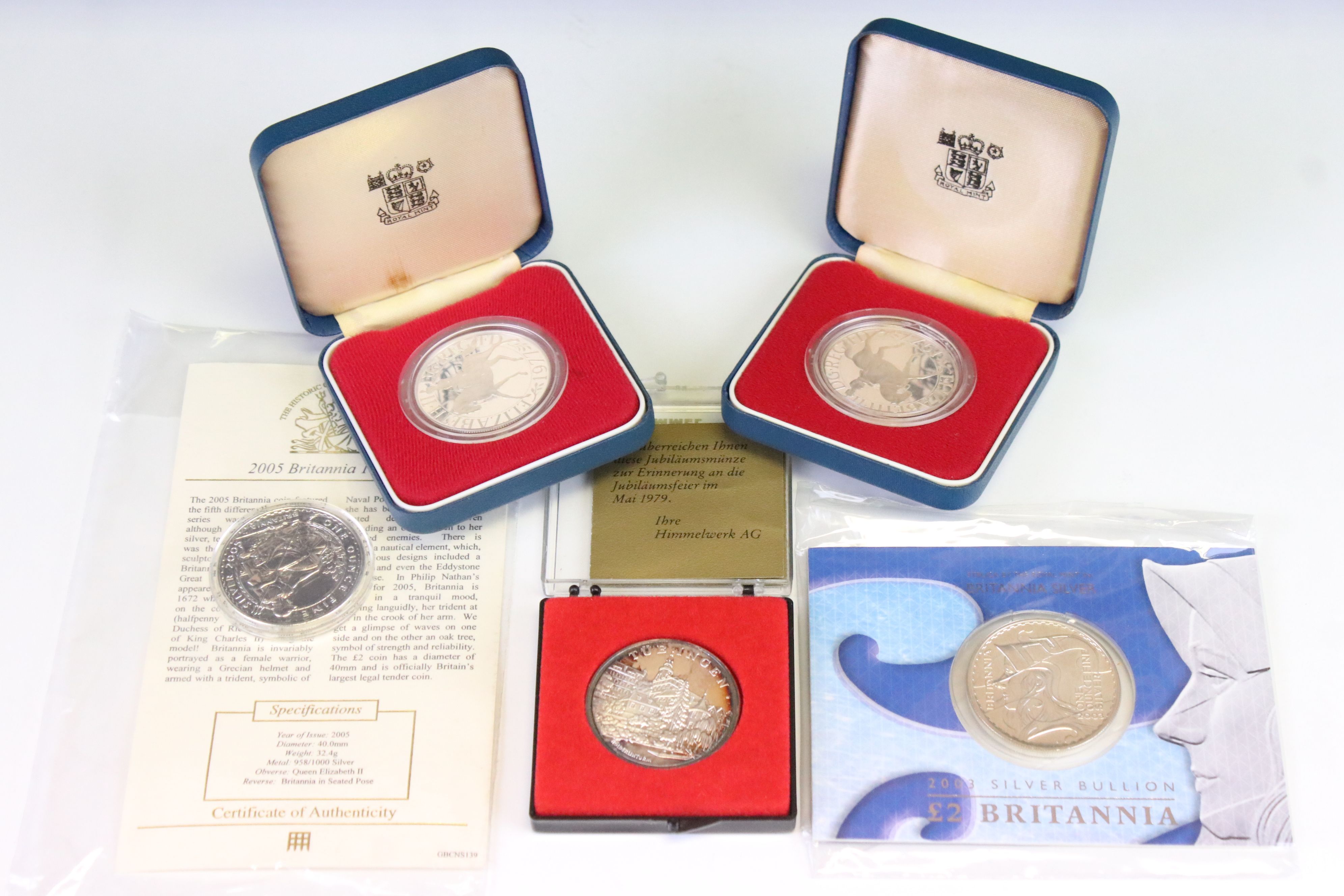 A Small Collection Of Royal Mint Uncirculated Coins To Include A 2003 Silver Bullion £2 Britannia