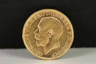 A British King George V 1912 gold full sovereign coin.