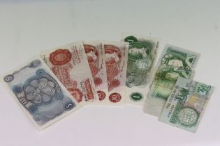 A small collection of British banknotes to include £1, £5 and 10 Shilling examples.