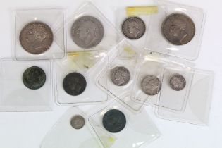 A collection of British King George IIII early milled silver and copper coins to include half crowns