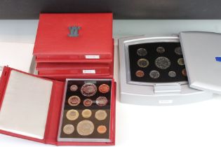 A Collection Of Six Royal Mint Proof Coin Year Sets To Include 2000, 2001, 2002, 2003, 2004 And 2005