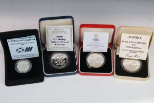 A Collection Of Four Cased Silver Proof Coins To Include The 1986 Scotland Commonwealth Games £2