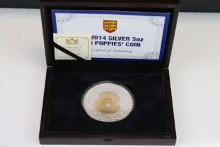 A Queen Elizabeth II 2014 The 100 Poppies silver 5oz coin, encapsulated within fitted display case