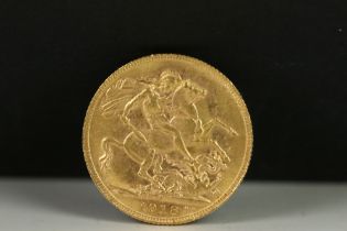 A British King George V 1918 gold full sovereign coin with Perth mint mark.