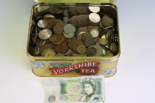 A collection of British and World coins to include a quantity of pre decimal silver examples,