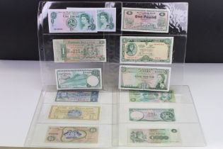 A Collection Of Thirteen Circulated And Uncirculated British And Irish Banknotes To Include Isle