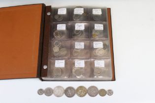 A collection of United States of America coins contained within an album to include many silver